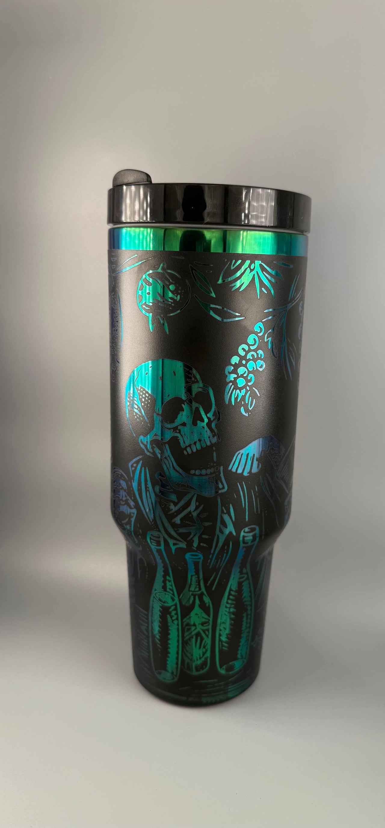 40 oz Tipsy Skeleton Tumbler with colorful metallic skull design and spill-resistant lid