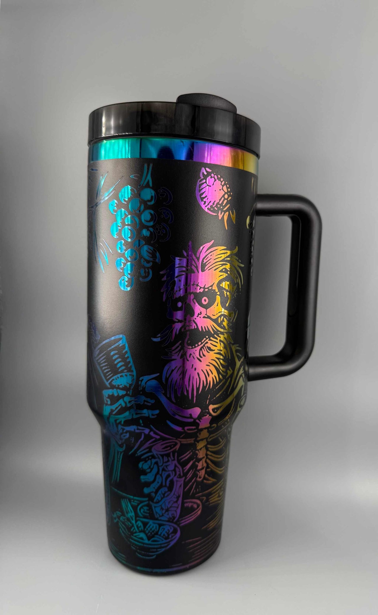 40 oz Tipsy Skeleton Tumbler with colorful metallic skull design and spill-resistant lid