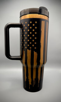 Travel mug with American flag design on a gray background